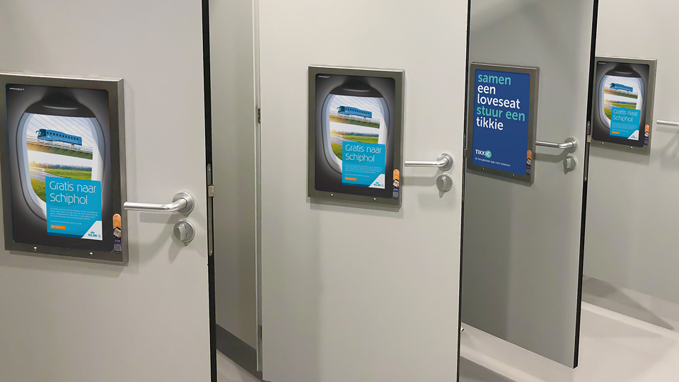 Altermedia KLM Nederland Toiletreclame WCreclame Toiletmedia Washroom media